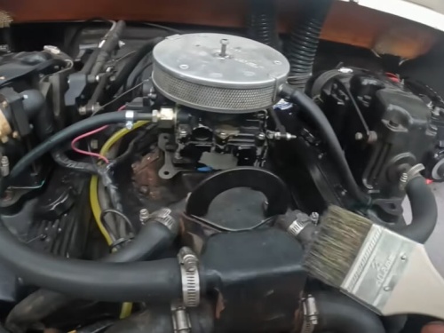 Inboard engine being cleaned