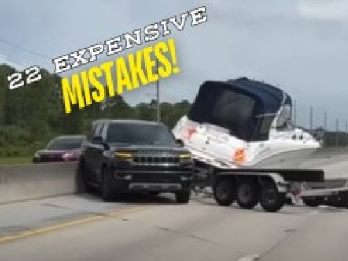 Highway crash with boat in tow
