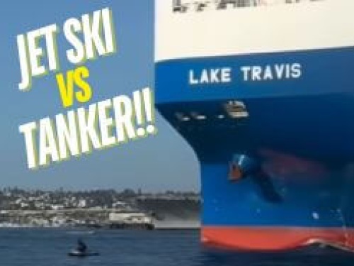 jet ski and large tanker