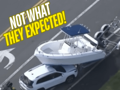 Boat goes on top of car on the highway