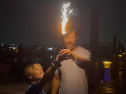 Capt Mark and son celebrate