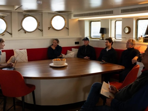 Crew meeting on the Scintilla Research Vessel