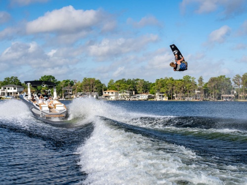 Water skiing behind Nautique G25 Paragon