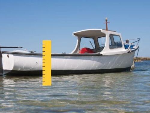 A boat with a shallow draft in shallow water