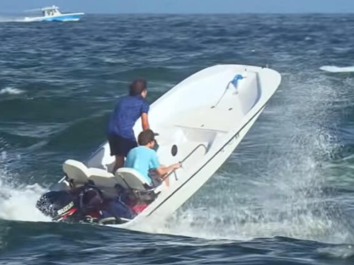 boat in waves at Boca Inlet
