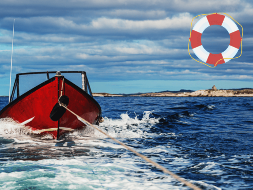 Boat in tow on the water