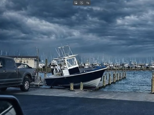 boat crashed on dock in marina
