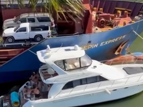 yacht hitting cargo ship