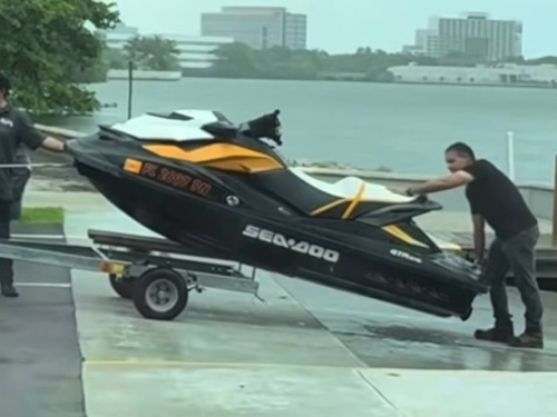 man holding jet ski