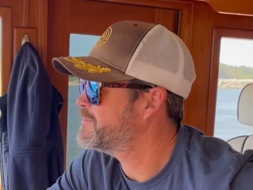 man inside cabin of boat