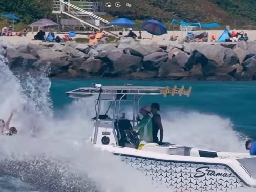 boat crashing through wave