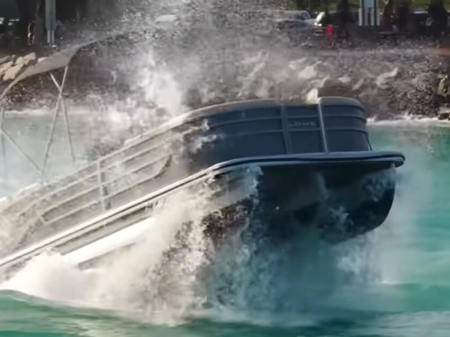 pontoon crashing through wave