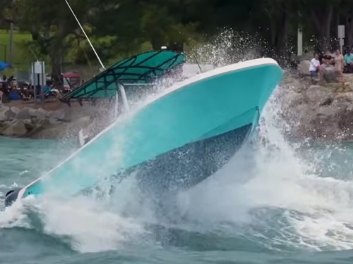 boat airborne over wave