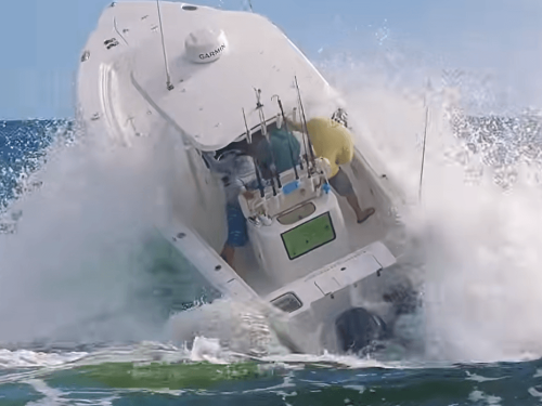 Boat crashing through waves at haulover