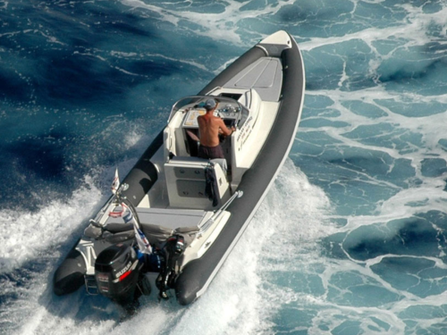 Rigid Hull Inflatable Boat, RIB, running in ocean