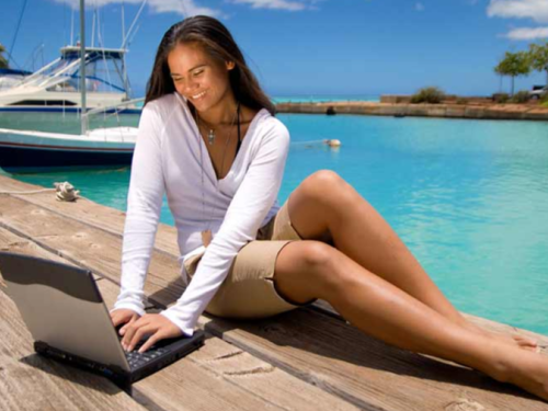 girl at dock, girl using laptop at dock