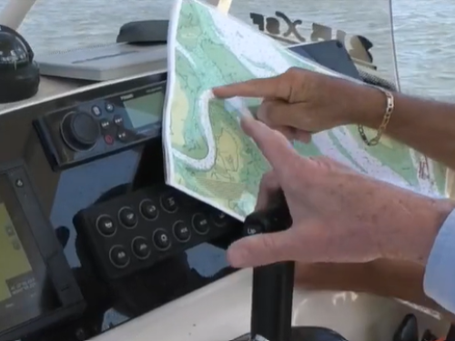 Looking at a map while boating