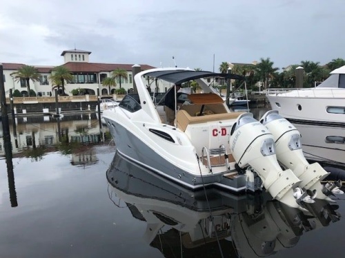 Boat with twin outboard engines