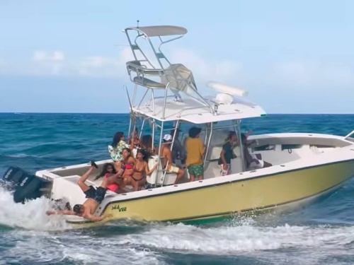 man falling off boat