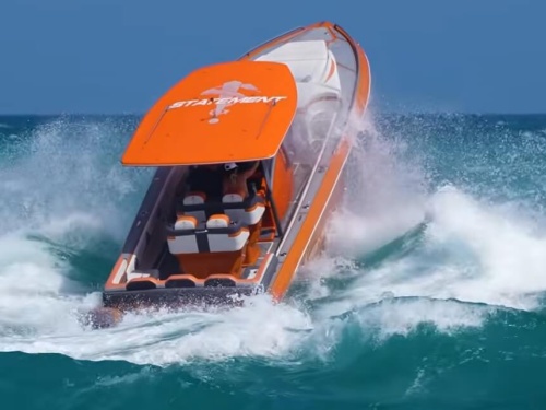 Boat crashes through wave