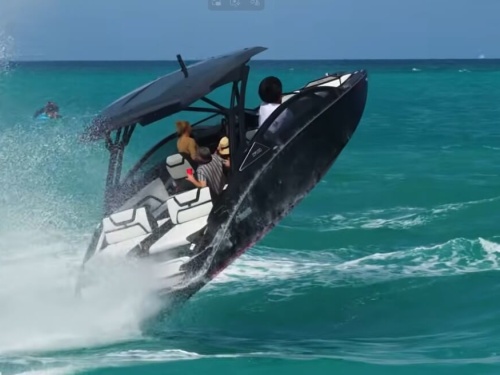 Boat crashing over wave